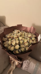 50 White roses - £500 bouquet