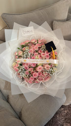 Pink spray rose grad bouquet