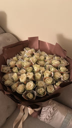 50 White roses - £500 bouquet