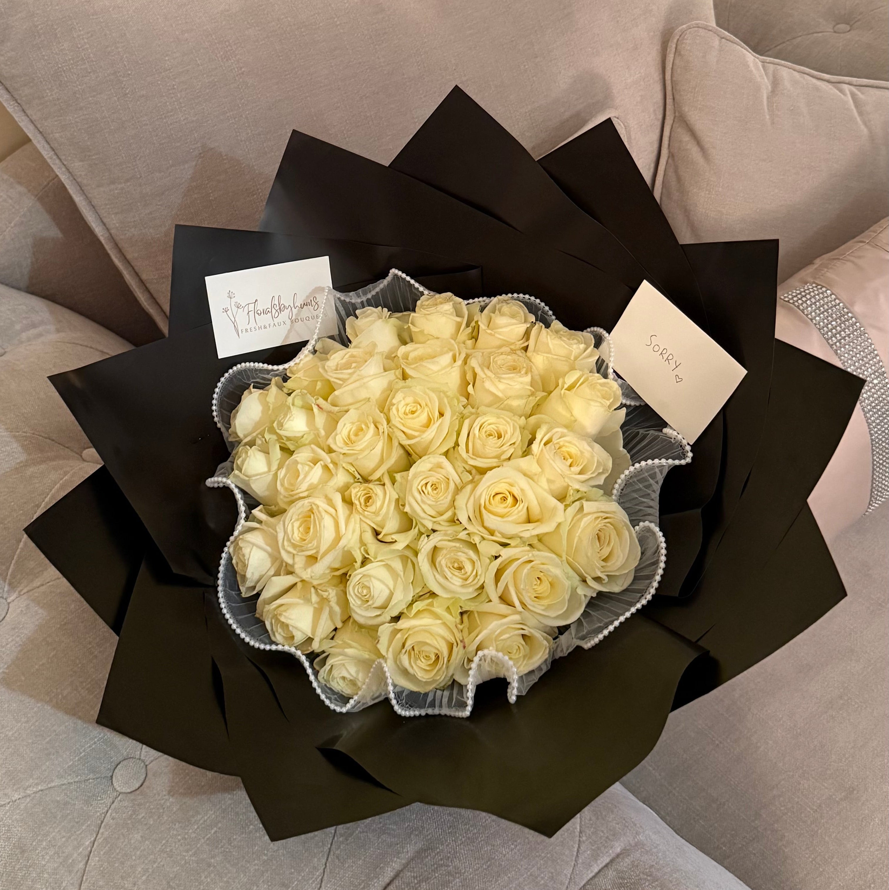 Premium white roses - (sorry) bouquet