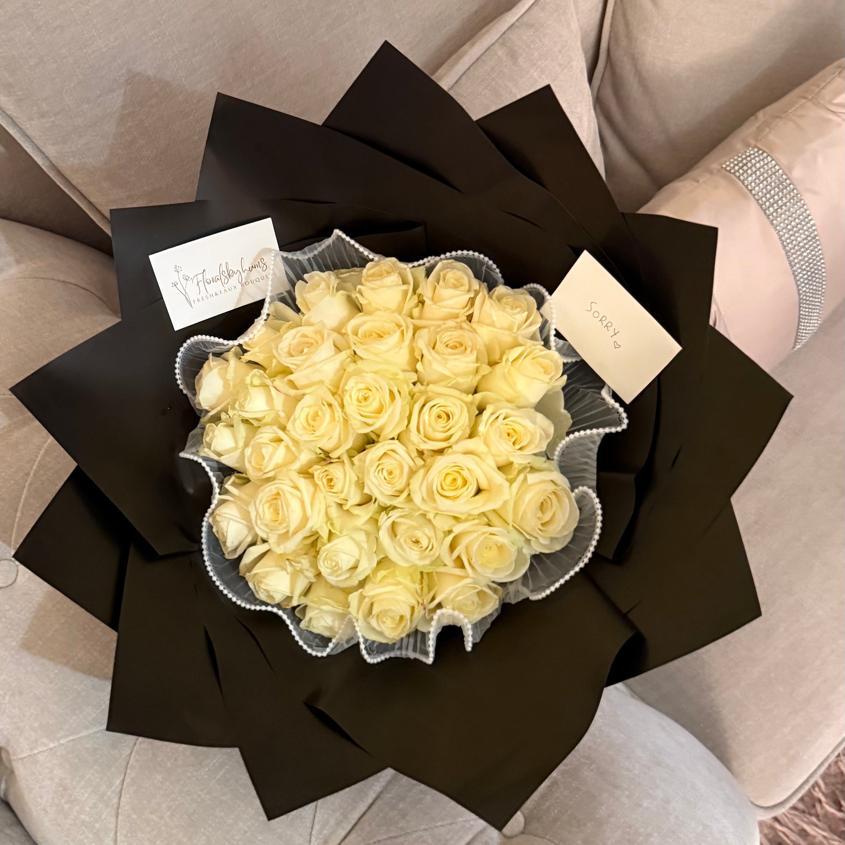 Premium white roses - (sorry) bouquet